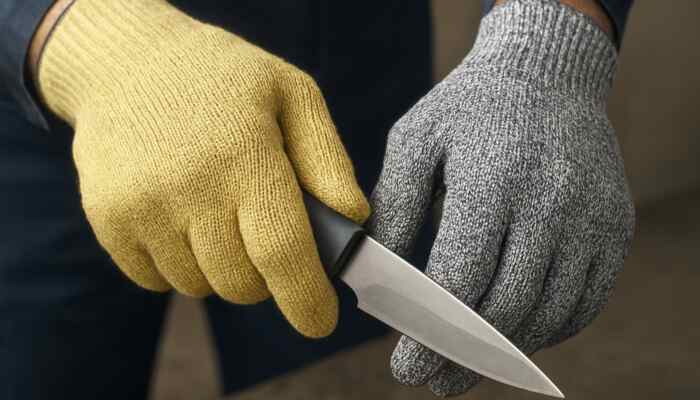 Cut Resistant Safety Gloves in Brighton: Close-up of cut-resistant gloves made from Kevlar, Dyneema, and steel mesh for construction and food processing protection.